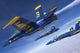 F/A-18 Hornets of the Blue Angels in formation over Colorado Poster Print.