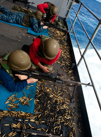 Sailors firing M240 machine guns on the fantail of USS John C. Stennis poster print.