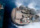 Landing craft air cushion entering USS Iwo Jima well deck poster print.