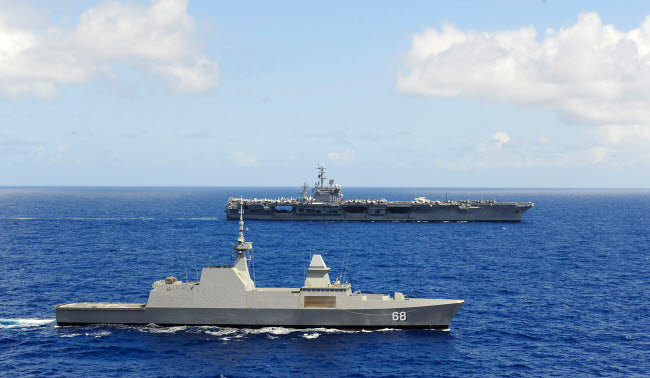 Republic of Singapore frigate RSS Formidable alongside USS Nimitz poster print