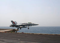 F/A-18C Hornet taking off from USS Enterprise poster print.
