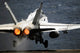 F/A-18C Hornet launching from USS Abraham Lincoln poster print
