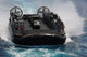 Landing Craft Air Cushion entering USS Essex poster print by Stocktrek Images.