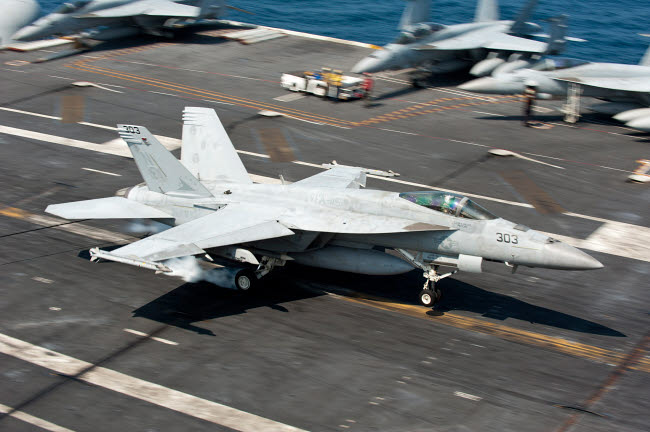 F/A-18E Super Hornet landing poster print by Stocktrek Images.