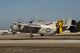 C-2 Greyhound landing at Naval Air Station North Island poster print.