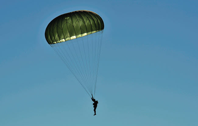 US Army paratrooper participating in a personnel drop poster print