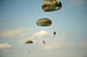 US Soldiers parachuting from C-23 Sherpa Poster Print