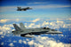 Two Royal Australian Air Force F/A-18 Hornets Poster Print showcasing military aviation.