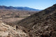 US Marine climbs a hill to conduct a site survey in Afghanistan poster print.