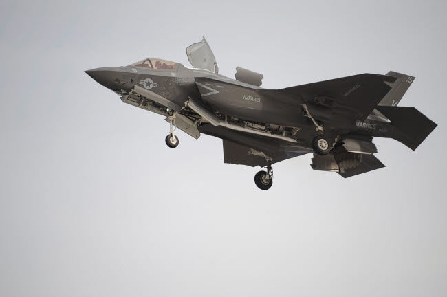 F-35B Lightning II Joint Strike Fighter preparing for vertical landing poster print.