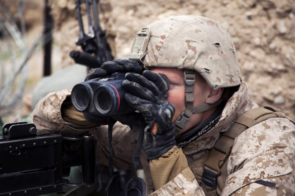 U.S. Marine scanning for enemy positions during Operation Bullseye in Afghanistan - Poster Print