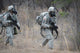 US soldiers in chemical warfare gear poster print by Stocktrek Images