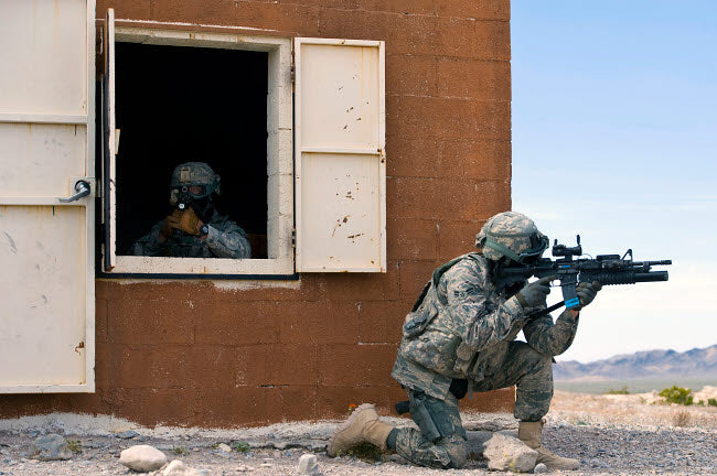 Security Forces Airmen Guarding a Building During Training Poster Print