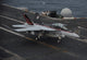 F/A-18F Super Hornet landing on USS Nimitz flight deck poster print.