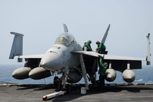 F/A-18F Super Hornet maintenance poster print featuring sailors.