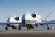 Two MQ-4C Triton unmanned aerial vehicles on the tarmac poster print.
