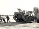 US Army M7 Howitzer Motor Carrier Unloading in Algiers Poster Print