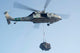 MH-60S Knighthawk delivering cargo poster print