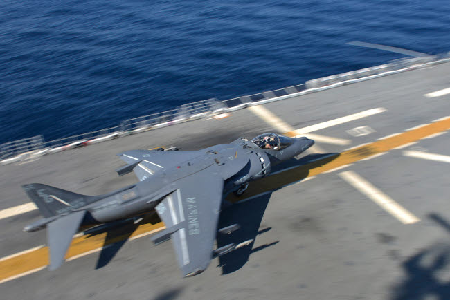AV-8B Harrier taking off from USS Bataan poster print