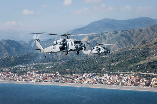 MH-60S Sea Hawk helicopters flying over Naples, Italy.