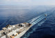 MH-60S Sea Hawk helicopters transporting supplies to ships poster print.
