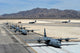 Seven C-130J Super Hercules aircraft taxiing at Creech Air Force Base poster print.