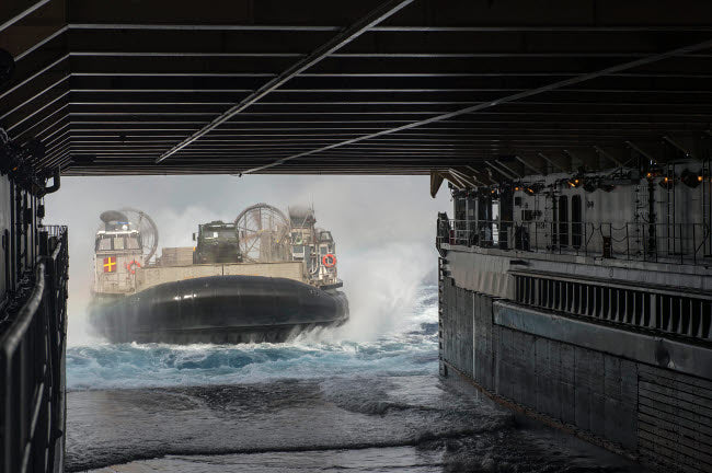 Landing craft air cushion entering USS Rushmore poster print