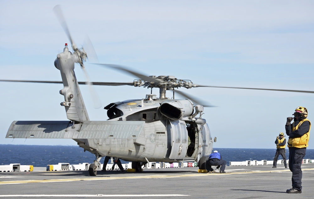 MH-60S Sea Hawk helicopter landing poster print in the Atlantic Ocean.