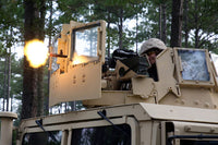 US Marine firing M-240B machine gun from humvee poster print