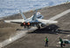 US Navy F/A-18C Hornet launching from USS Nimitz poster print.