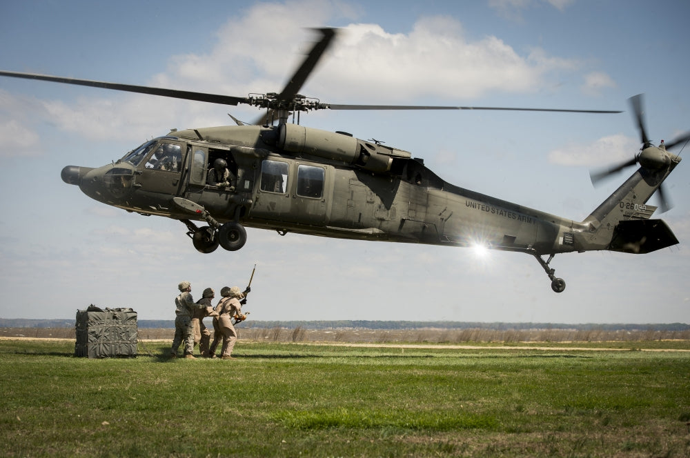 U.S. Marines sling load training under UH-60 Black Hawk helicopter poster print.