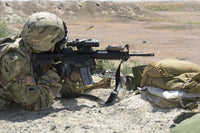 Oregon Army National Guard M4 Rifle Poster Print showcasing a soldier firing an M4 rifle.