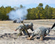 US Army National Guardsmen firing a 60mm mortar round poster print.