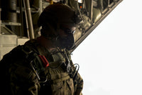 U.S. Army Green Beret preparing to jump from a C-130H3 Hercules aircraft poster print.