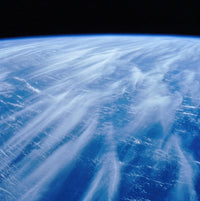 Clouds Over the Indian Ocean Poster Print showcasing serene cloud formations above sparkling waters.