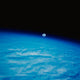 Earth from Space with Moon Poster Print by Stocktrek Images