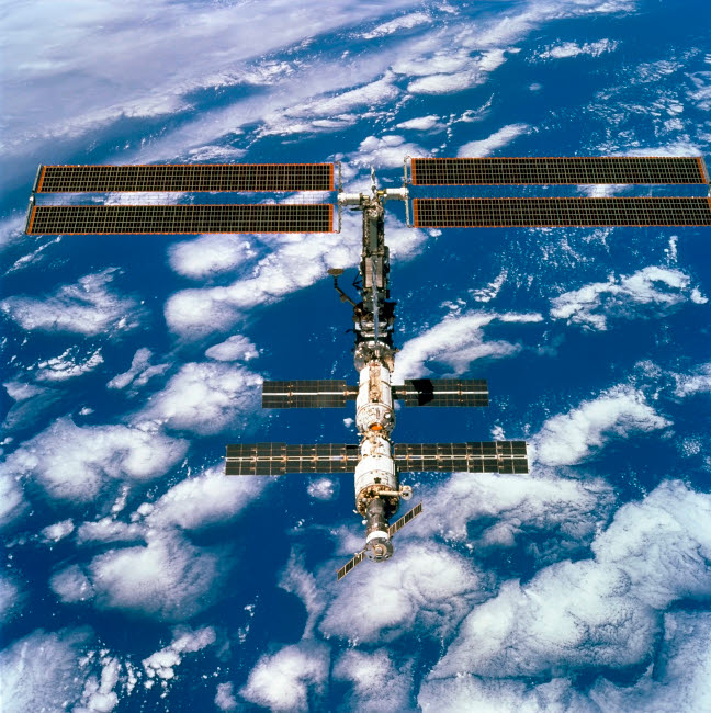 International Space Station Poster Print showcasing vibrant space art.