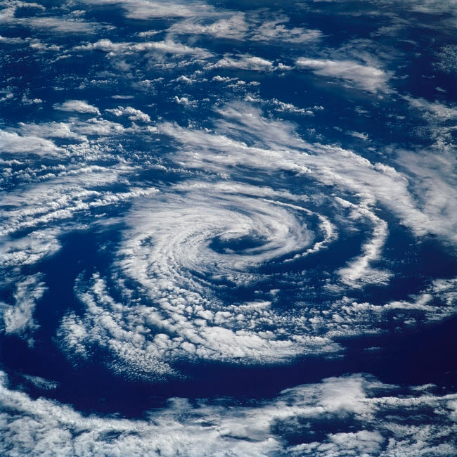 Circular Clouds Poster Print showcasing stunning aerial cloud formations.