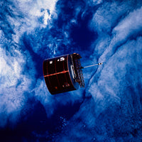 Satellite Over Earth Poster Print showcasing Earth's beauty from space.