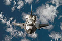 Space Shuttle Discovery Poster Print showcasing the iconic shuttle in flight.