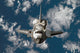 Space Shuttle Discovery Poster Print showcasing the iconic shuttle in flight.