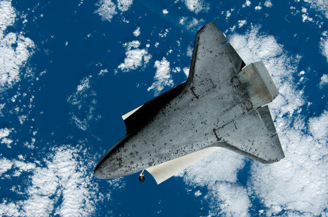 Space Shuttle Discovery Poster Print showcasing NASA's iconic spacecraft.