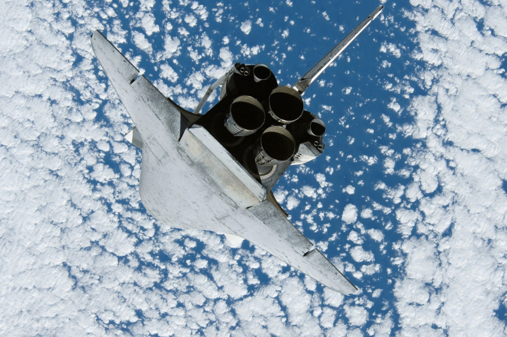 Space Shuttle Discovery Poster Print showcasing the iconic spacecraft.