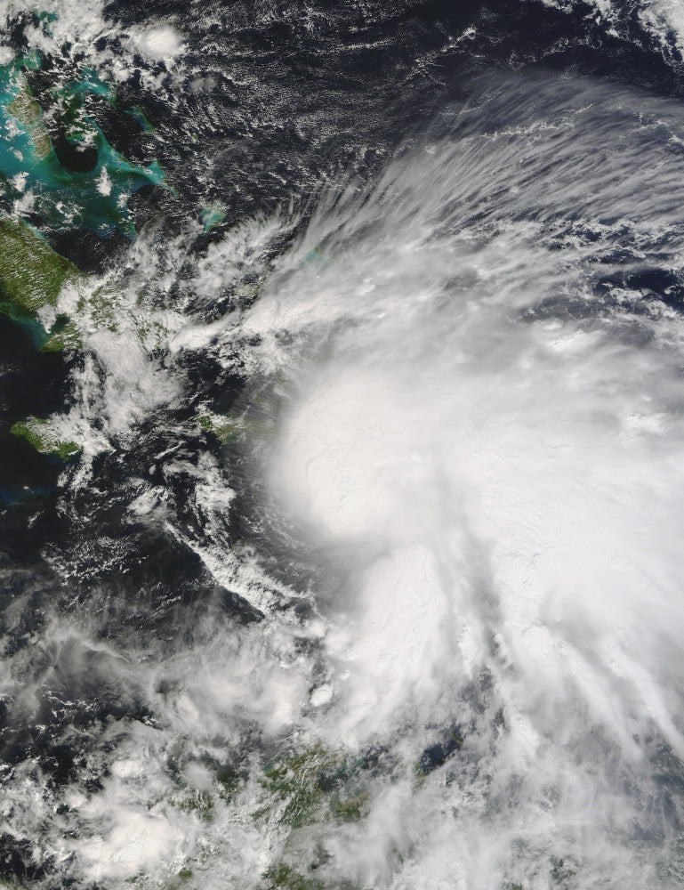 Tropical Storm Noel poster print depicting storm over Haiti and Dominican Republic.