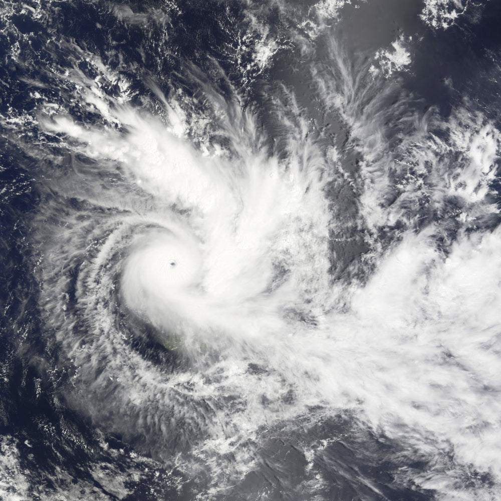 Tropical Cyclone Daman Poster Print featuring a cyclone over the South Pacific Ocean.