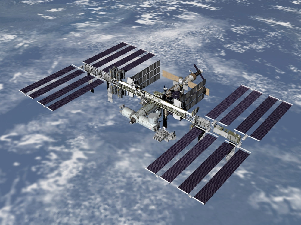 High-angle view of the International Space Station poster print from October 2006.