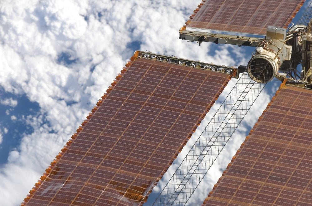 Close-up view of a repaired solar array on the International Space Station poster print