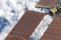 Close-up view of a repaired solar array on the International Space Station poster print
