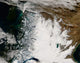 Ash plume from Chaiten volcano over snow in southern Chile and Argentina.