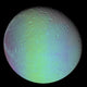 False color view of Saturn's moon Dione poster print showcasing vibrant colors and details.